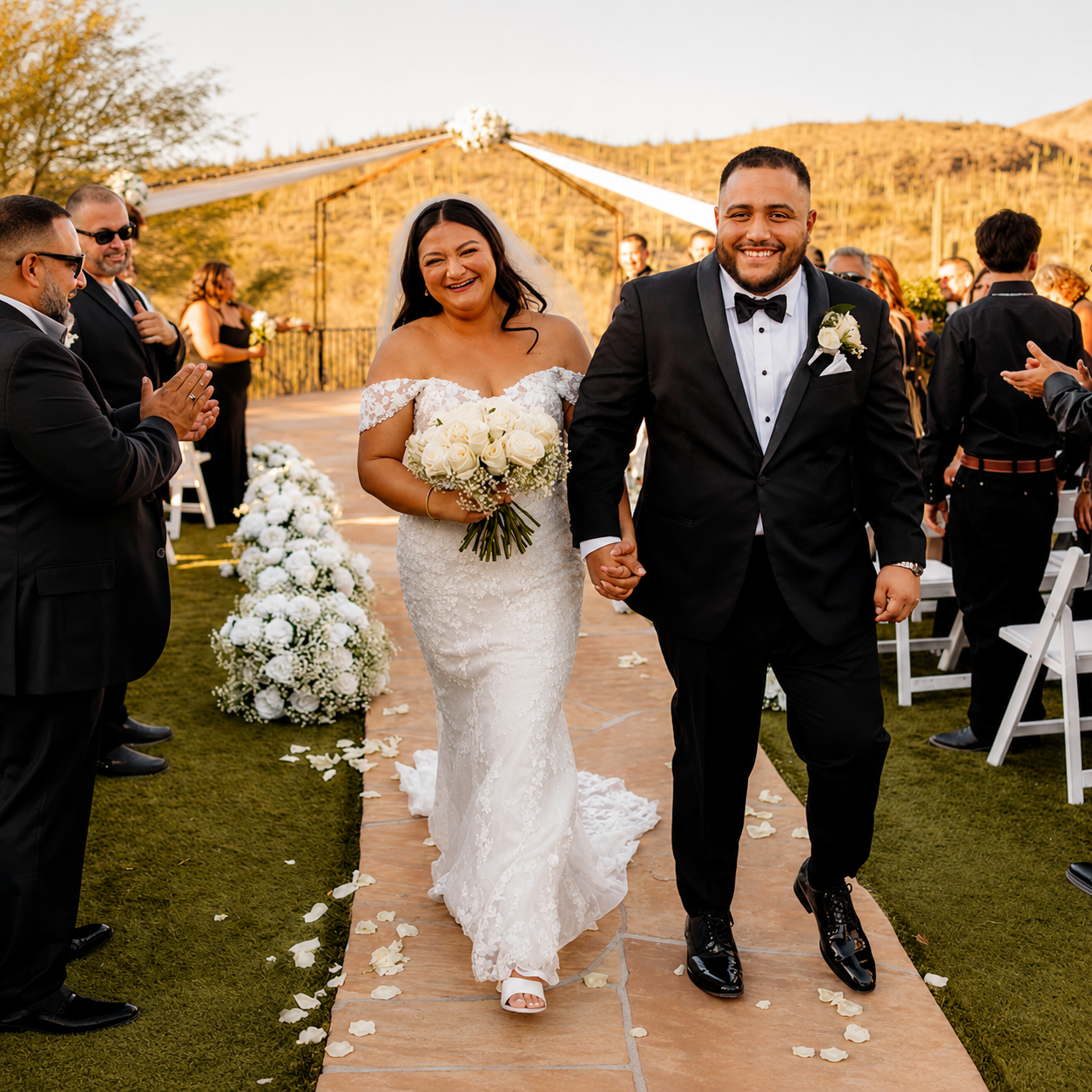 Bride and groom recessional at a Sonoran sunset wedding